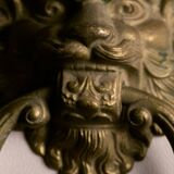 Lion door knocker, in brass