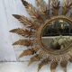 Miroir soleil métal vieilli design années 70