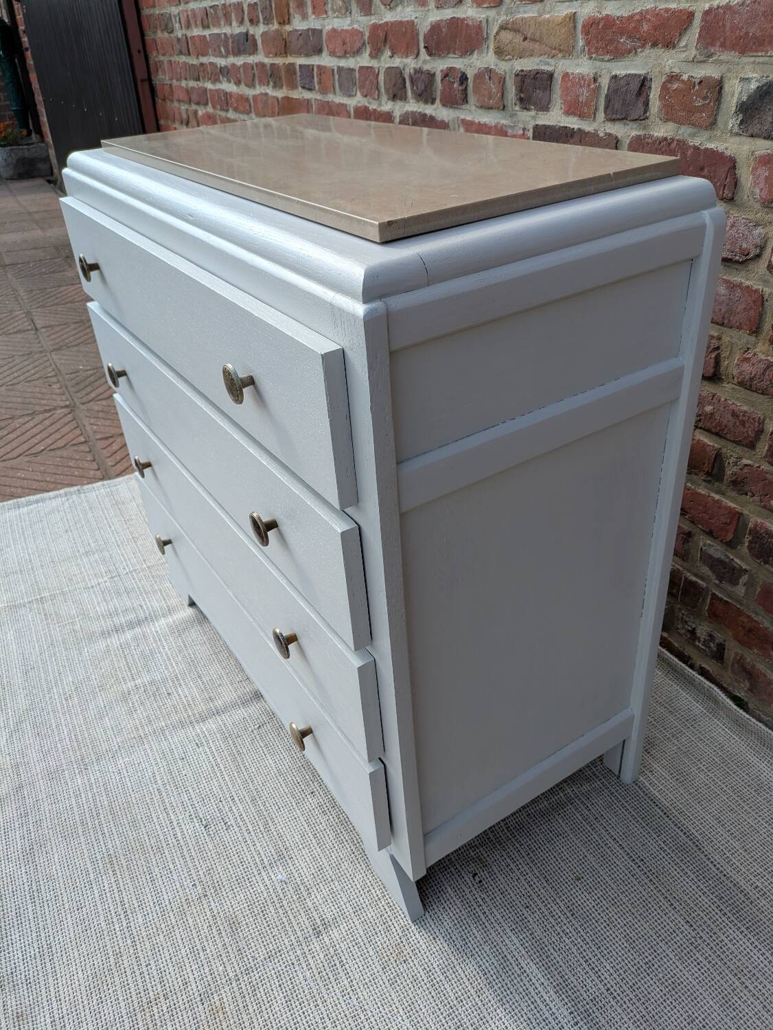Marble-topped chest of drawers