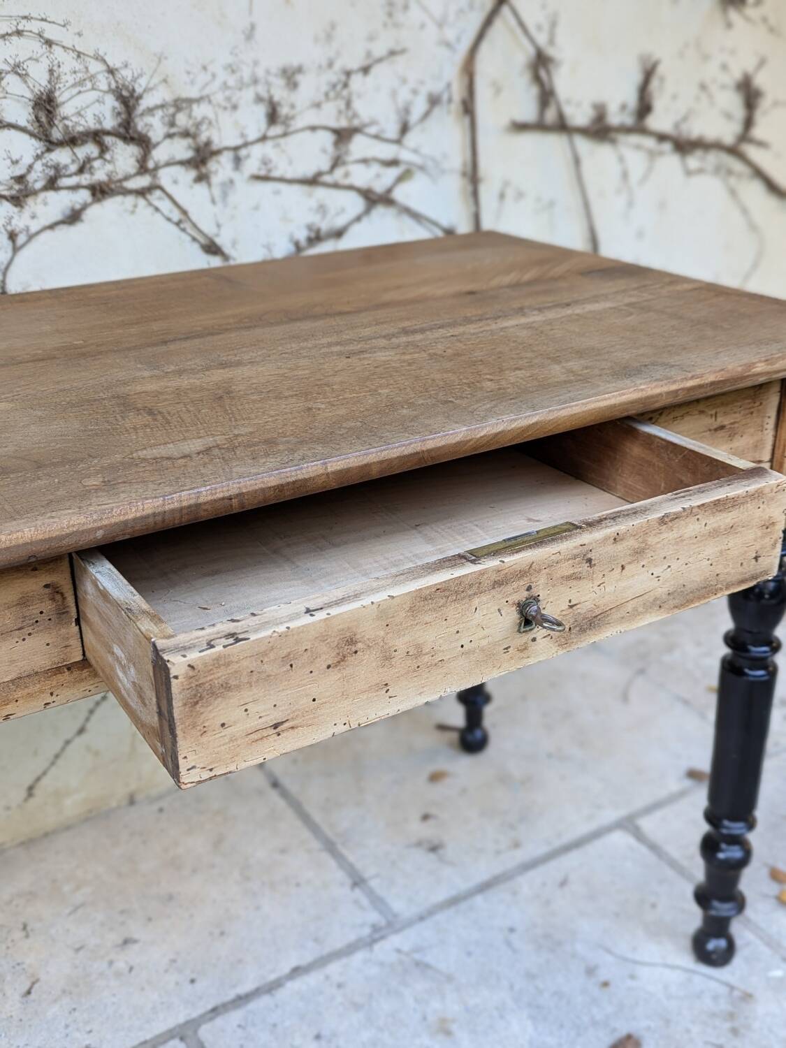 Solid wood desk, black base