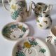 Japanese-style tea set in cracked earthenware with chrysanthemum flowers