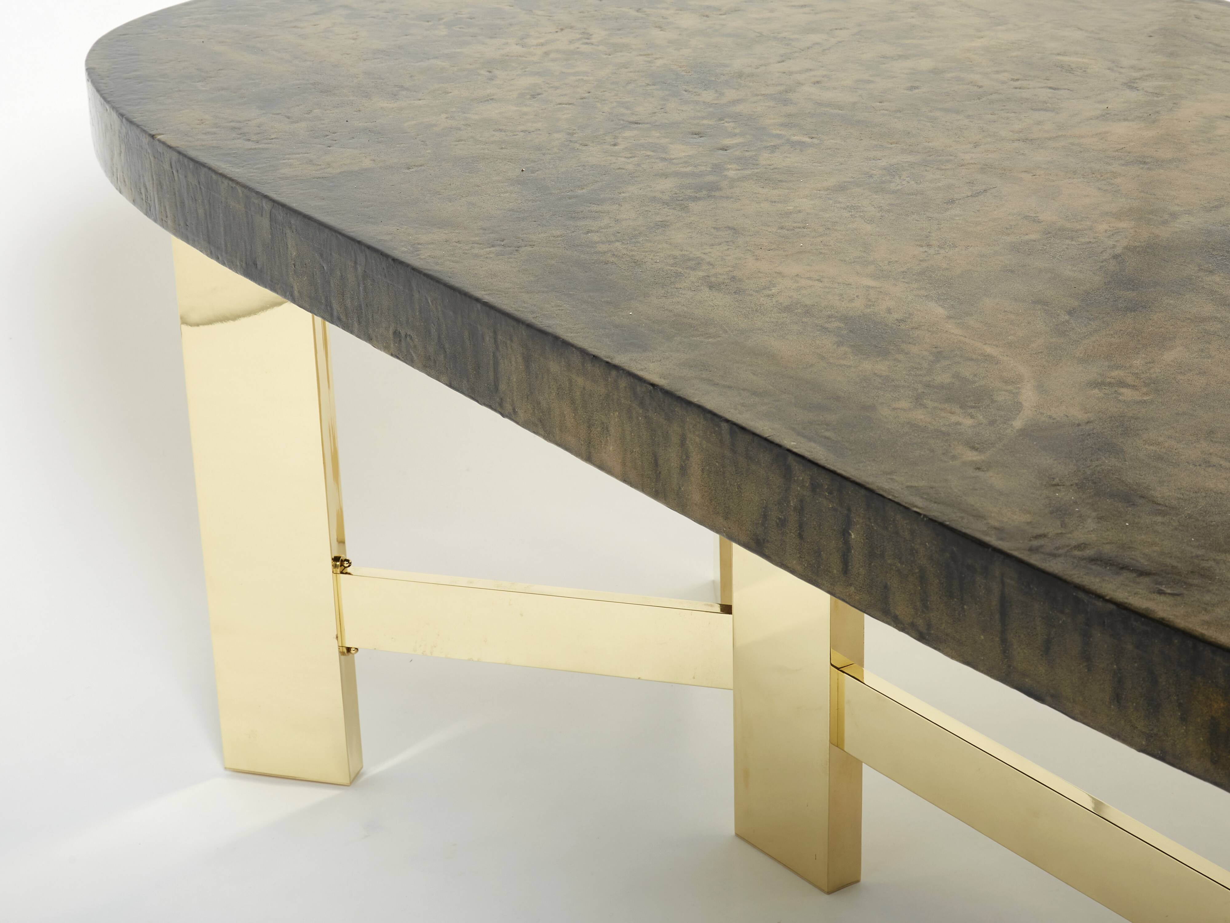 Brutalist Belgian dining table in resin and brass from around 1970.