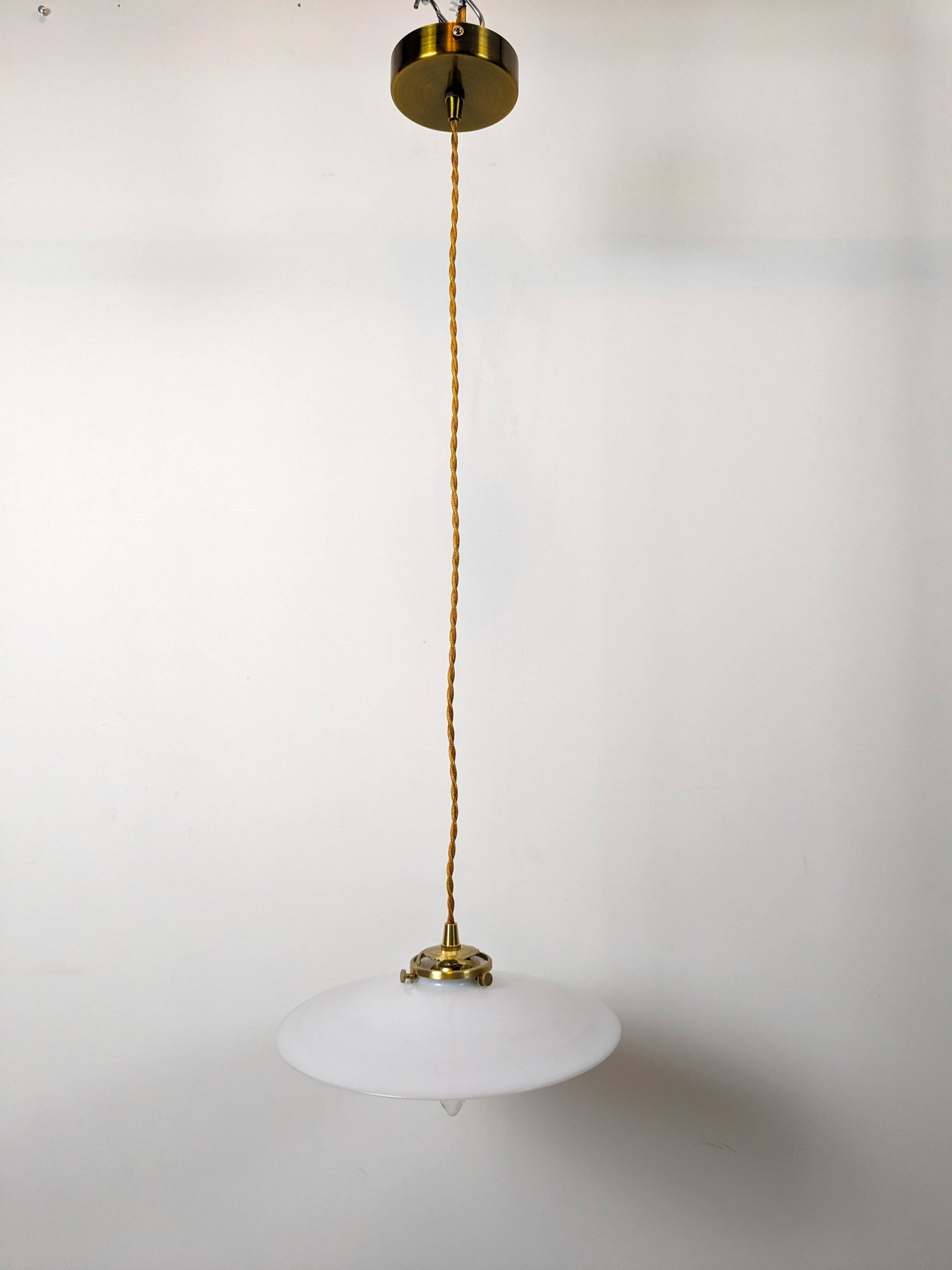 Vintage suspension in white opaline, elegant light fixture with soft light.