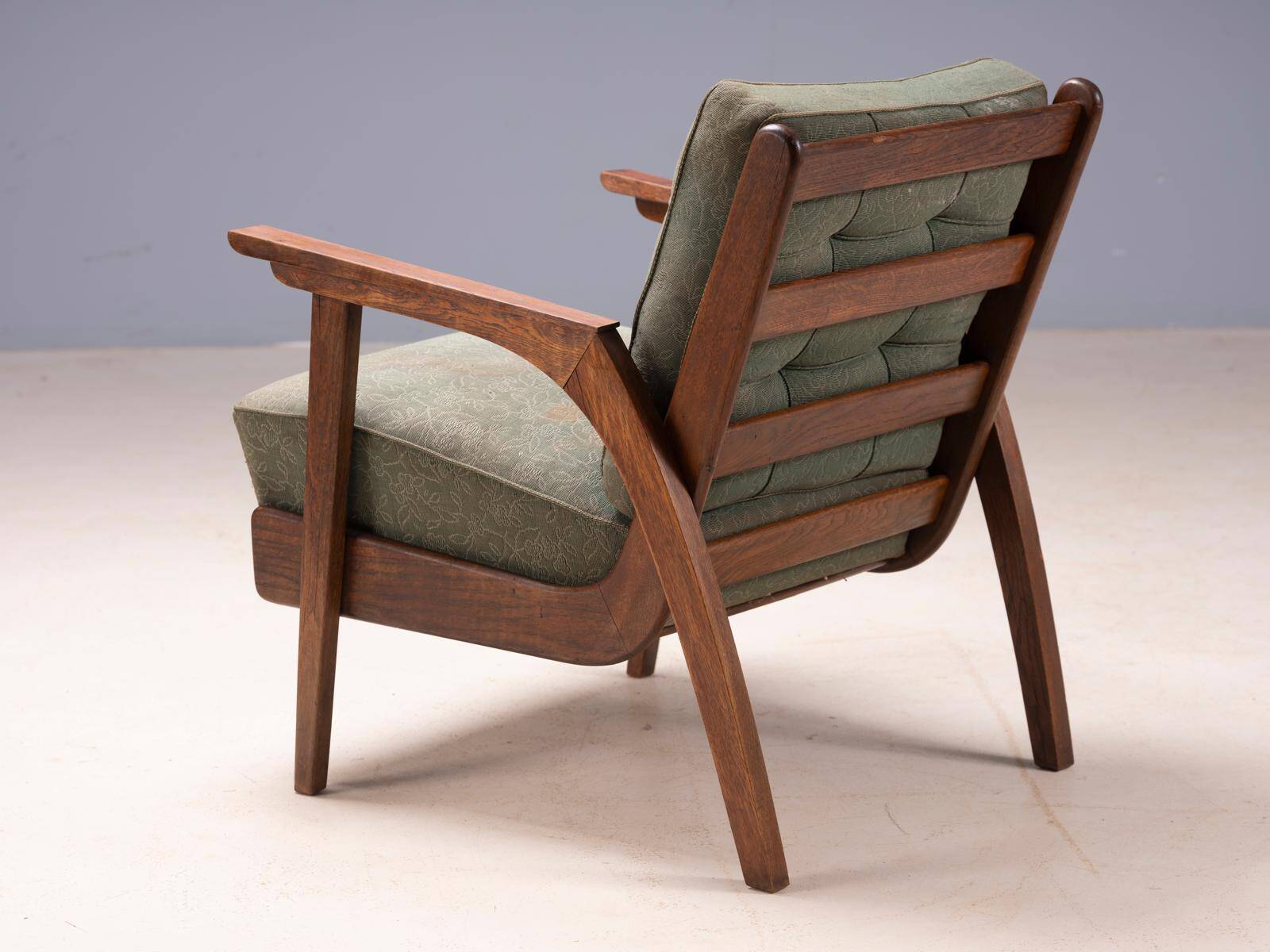 Pair of vintage mid-century lounge armchairs with wooden frames and green upholstery, 68 × 78 × 84 cm