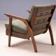 Pair of vintage mid-century lounge armchairs with wooden frames and green upholstery, 68 × 78 × 84 cm