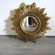 Golden sunburst convex vintage mirror from the 1960s.