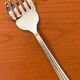 Christofle Aria gold ring serving fork