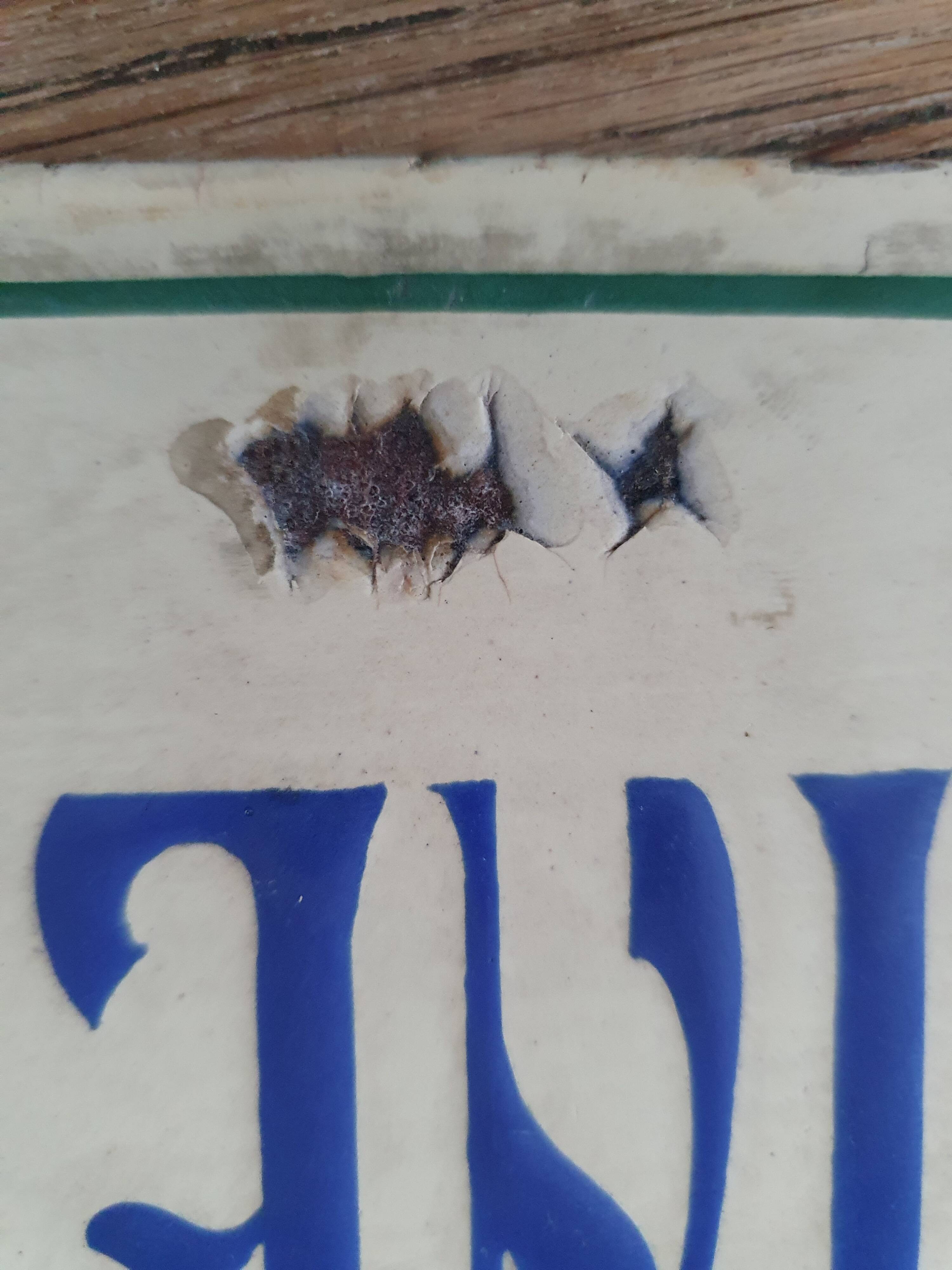 Old enameled house plate