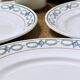 Antique ironstone plates from St Amand with a garland