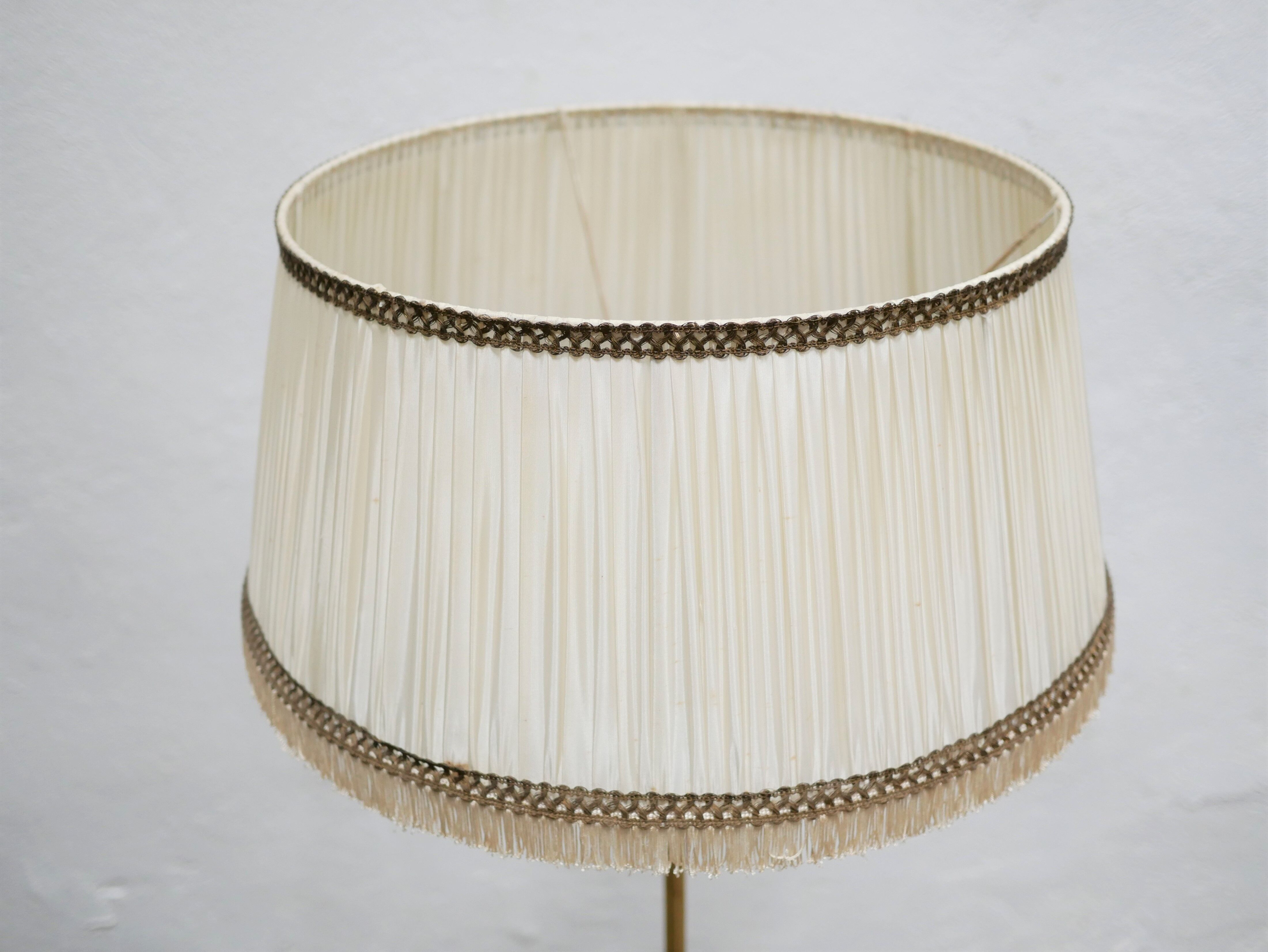 Vintage brass tripod floor lamp