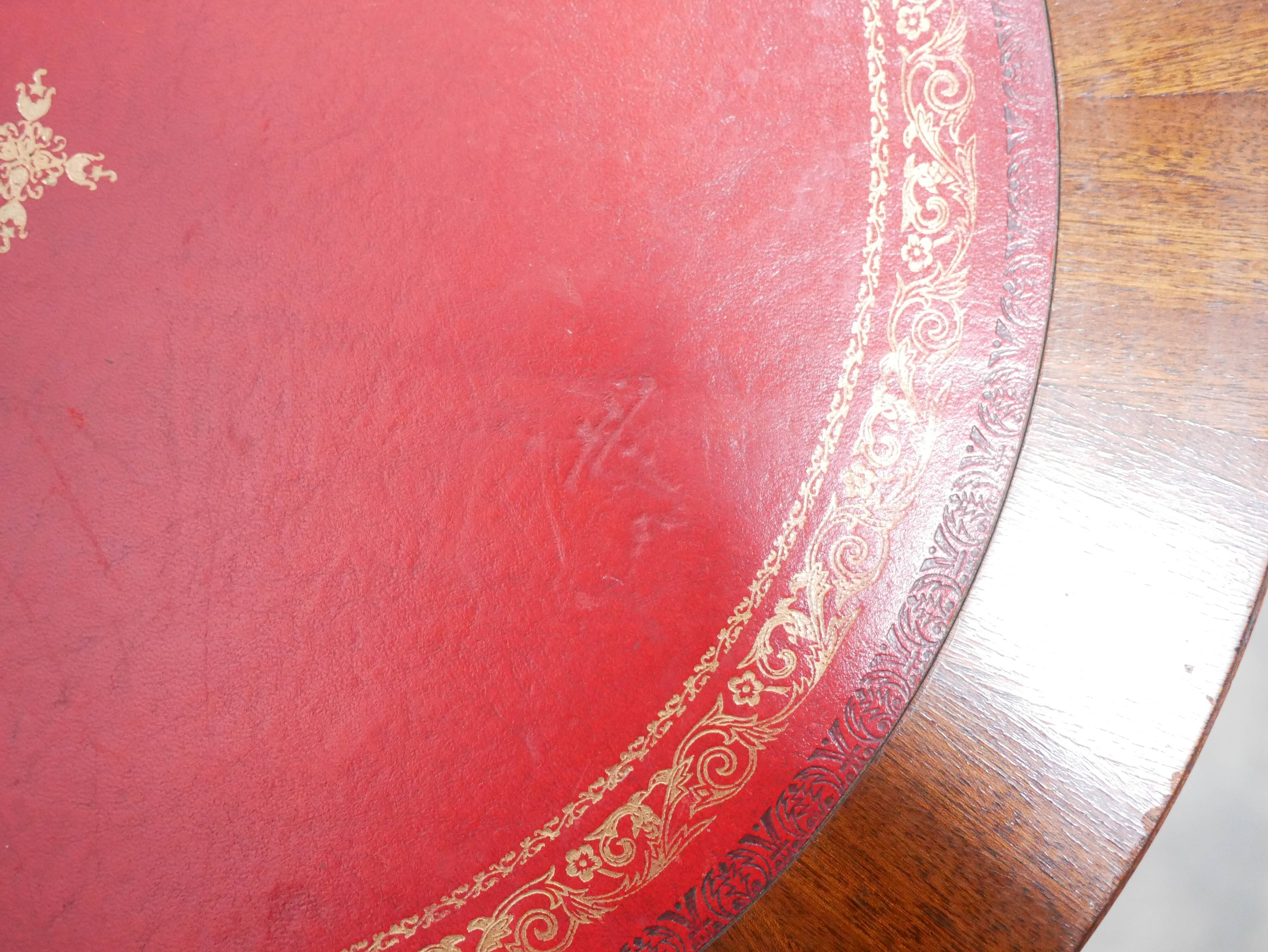 Vintage English pedestal table in wood and leather