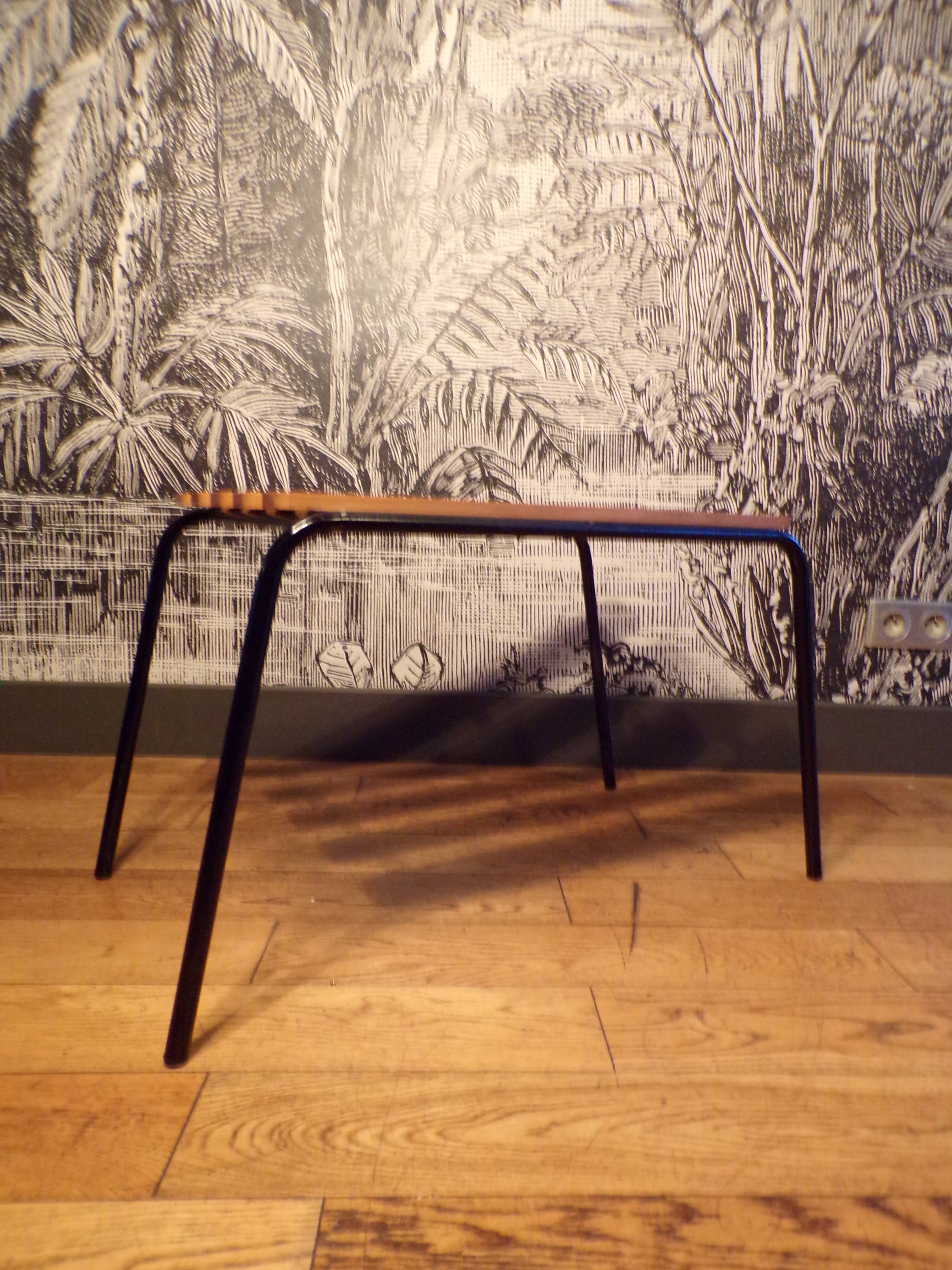 Old 1950s suitcase bench with wooden slats