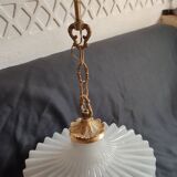 Round pendant light in pleated semi-opaque glass
