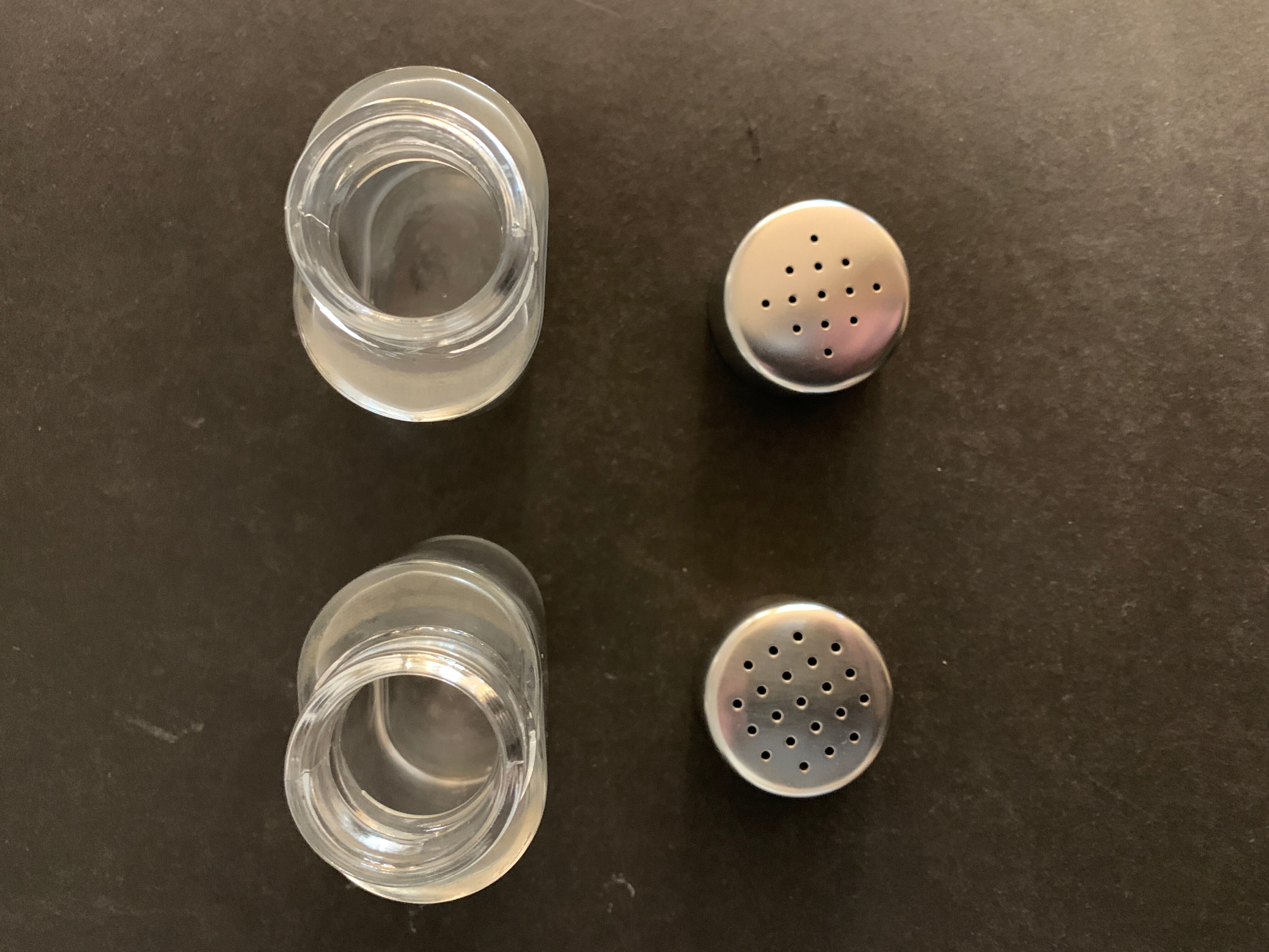 Italian salt and pepper shaker in stainless steel and Alessi glass, 1980