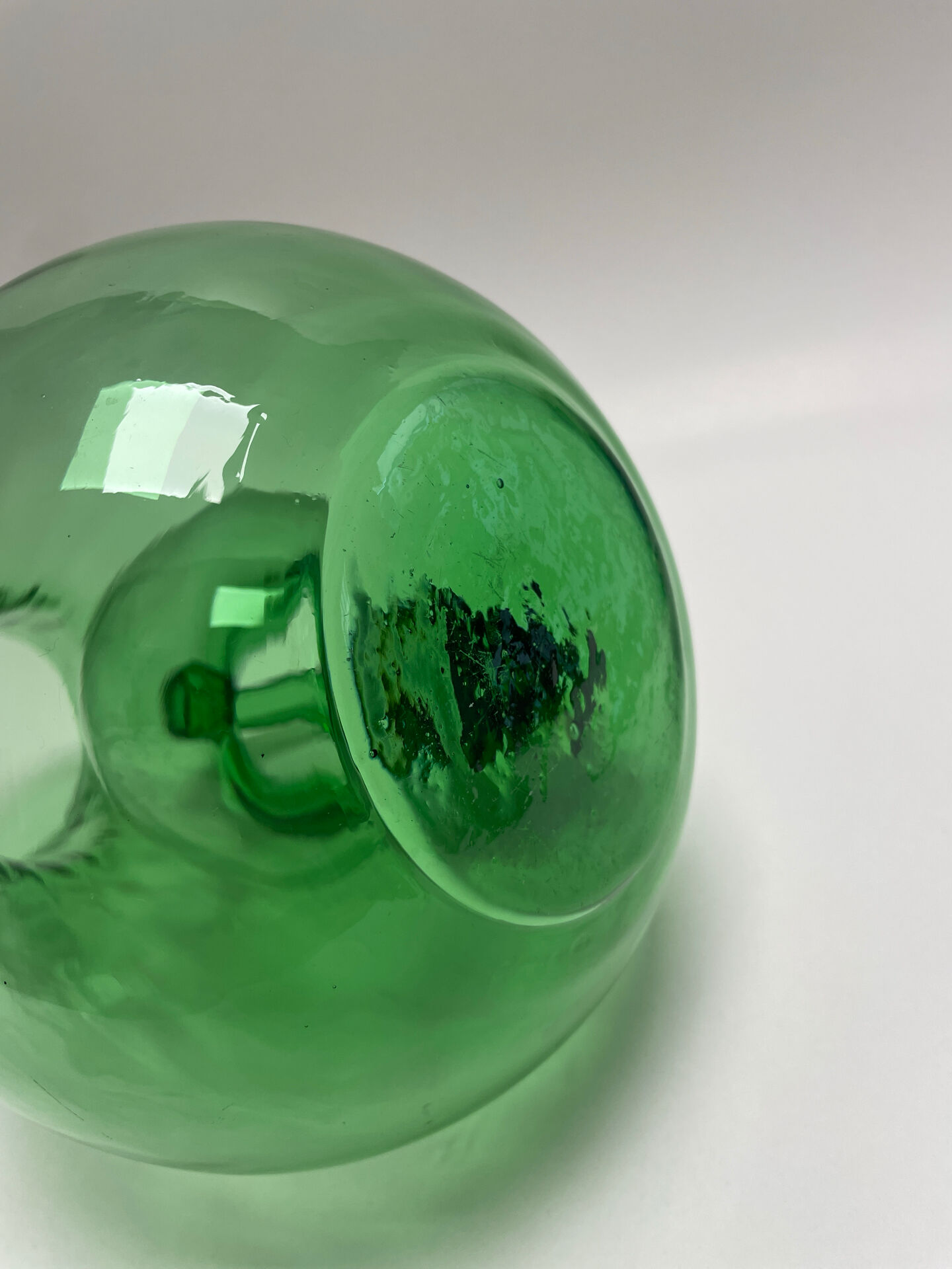 Large green glass cooling jug