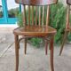 pair of dark bistro chairs, rounded backs, Baumann style