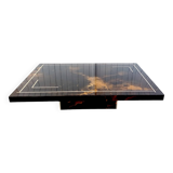 Table basse laquée à décor solaire