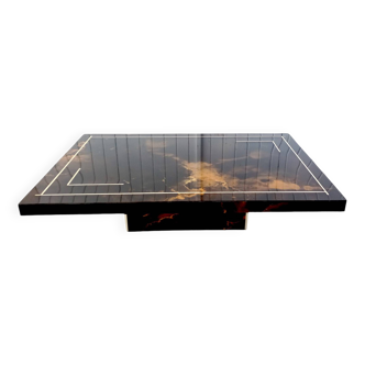 Lacquered coffee table with solar decoration