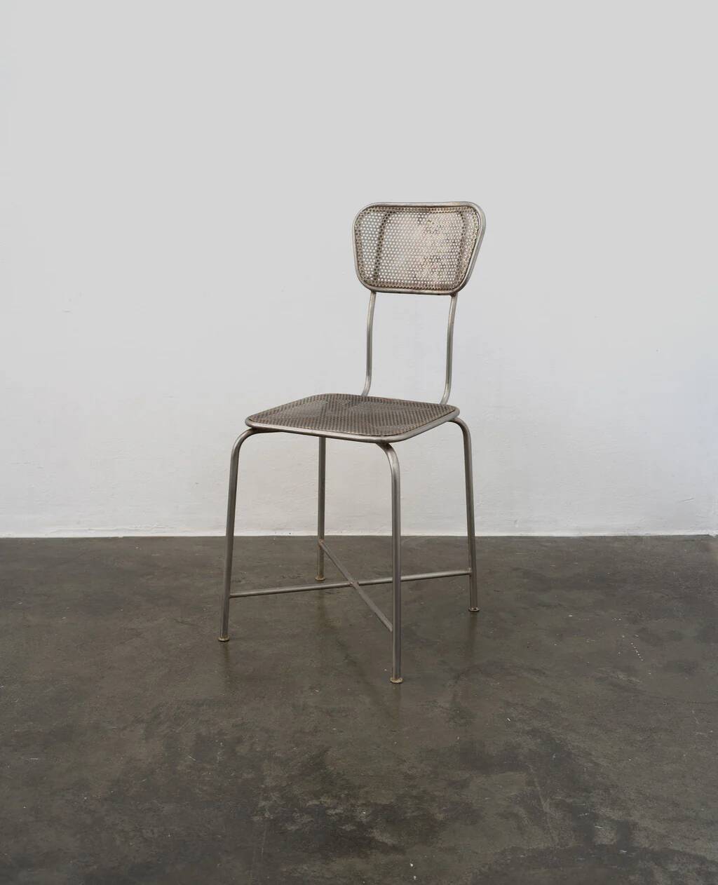 Vintage perforated metal chairs