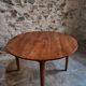 Antique round dining table in cherry wood, France, circa 1920.