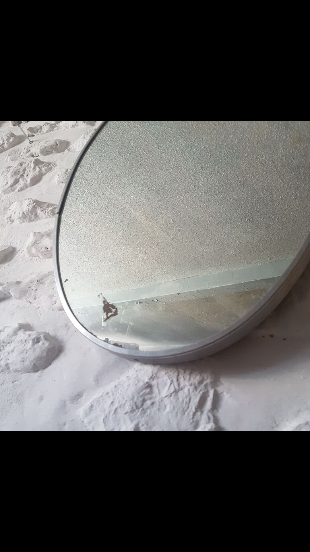 Old aluminum oval mirror