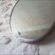 Old aluminum oval mirror