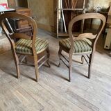 Set of two wooden and fabric chairs