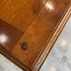 Occasional table in cherry wood, 1 drawer, 1 cane shelf, 1950.
