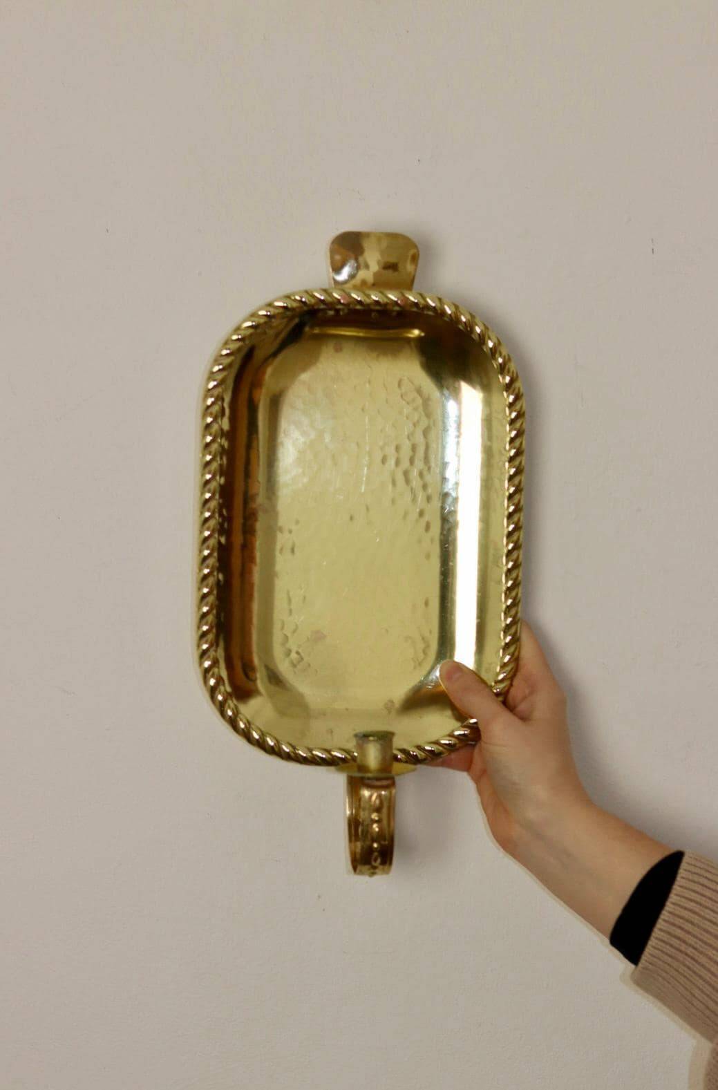 Pair of Swedish brass wall sconces from the mid-century.