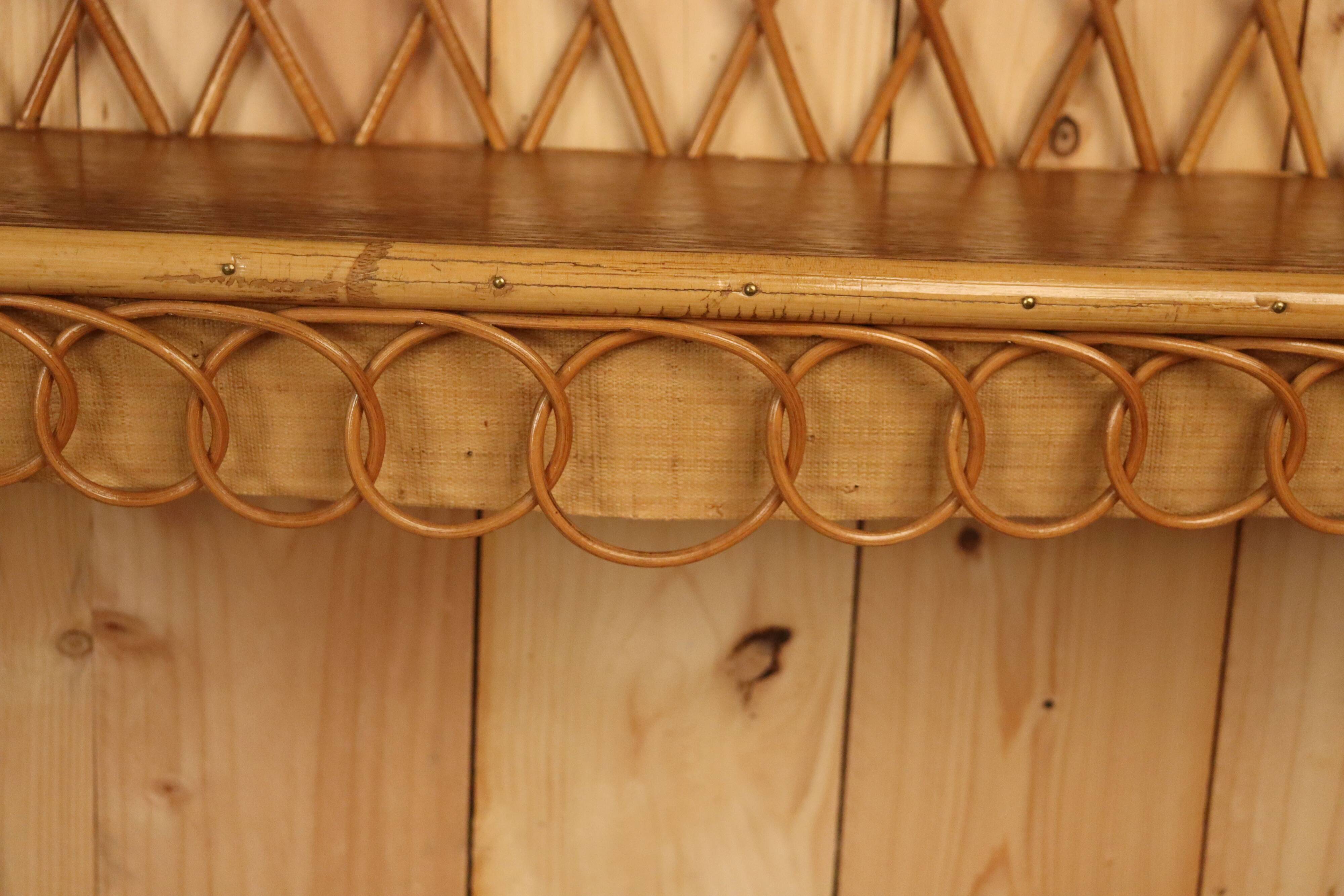 Pair of rattan wall shelves attributed to Audoux Minet