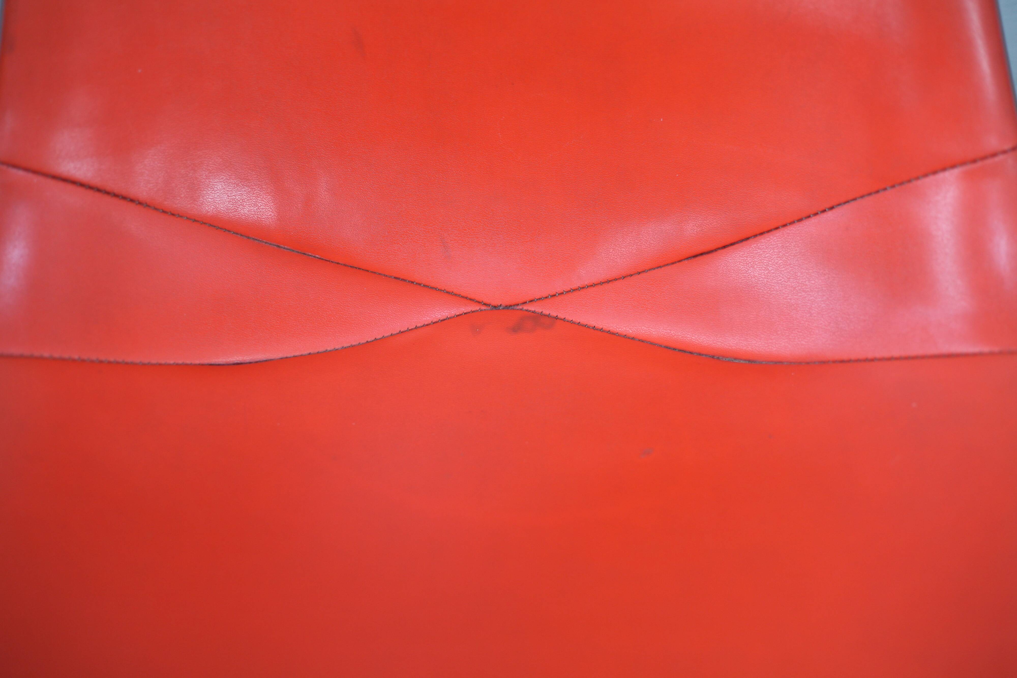 Ray & Charles Eames, Herman Miller edition, set of 4 orange chairs. Circa 1960
