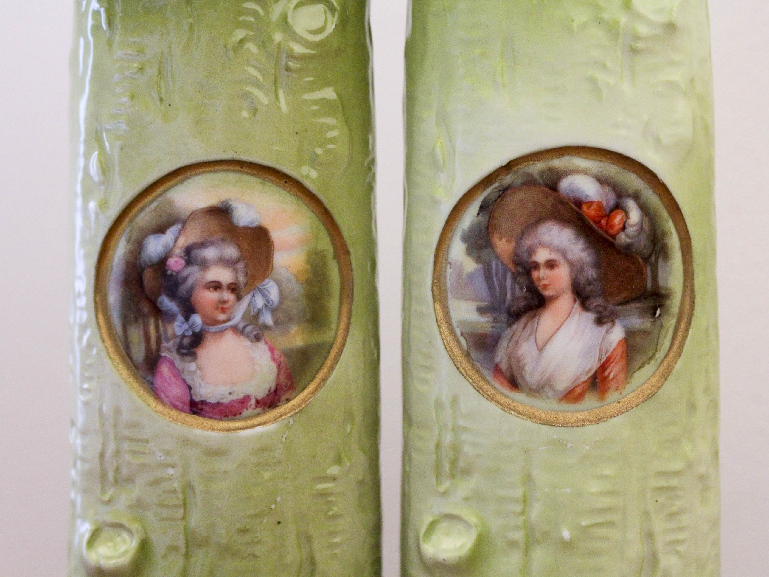 Pair of porcelain vases with portrait decoration of a woman