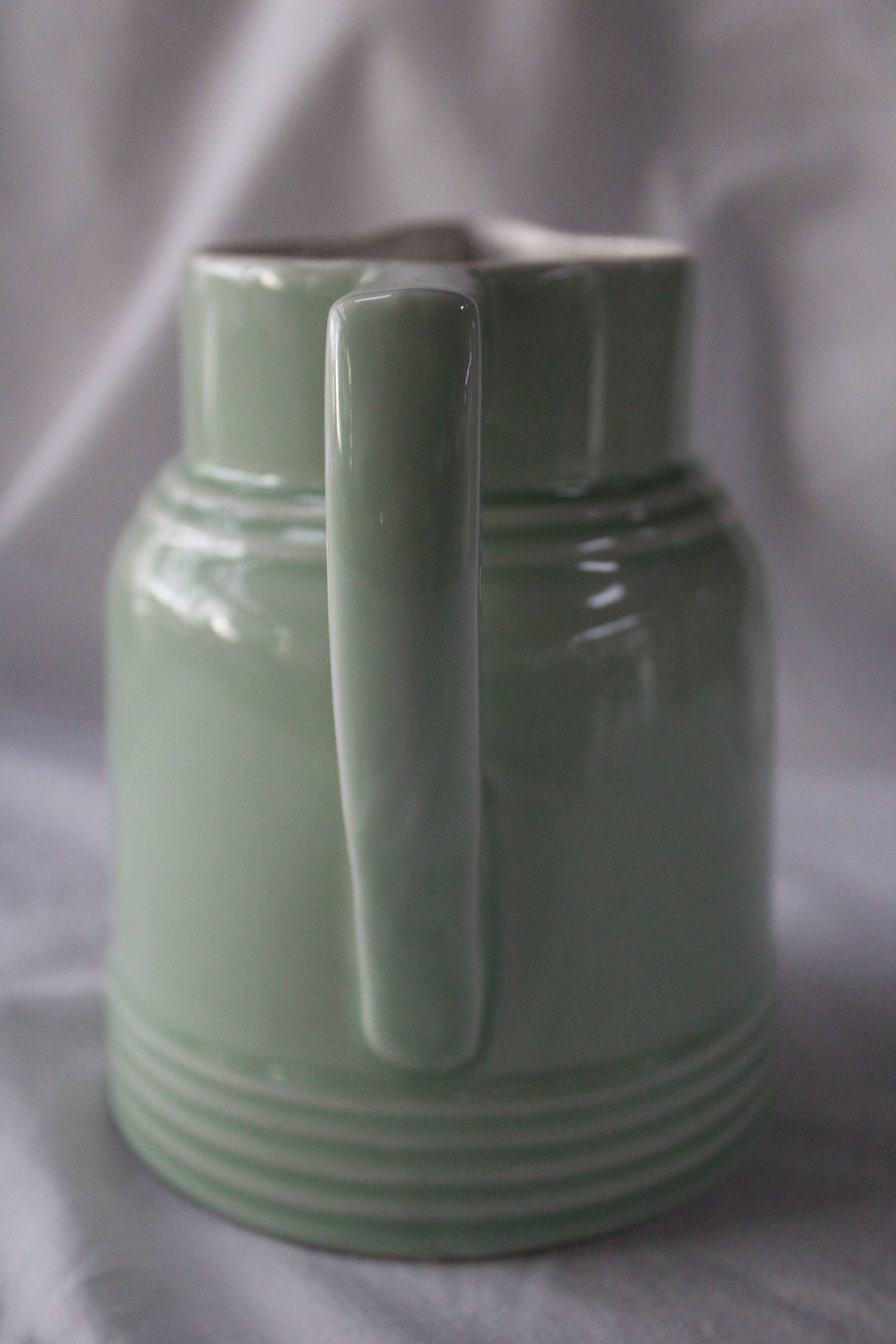 Old mint green pitcher