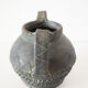 Vase with double handle in black sandstone