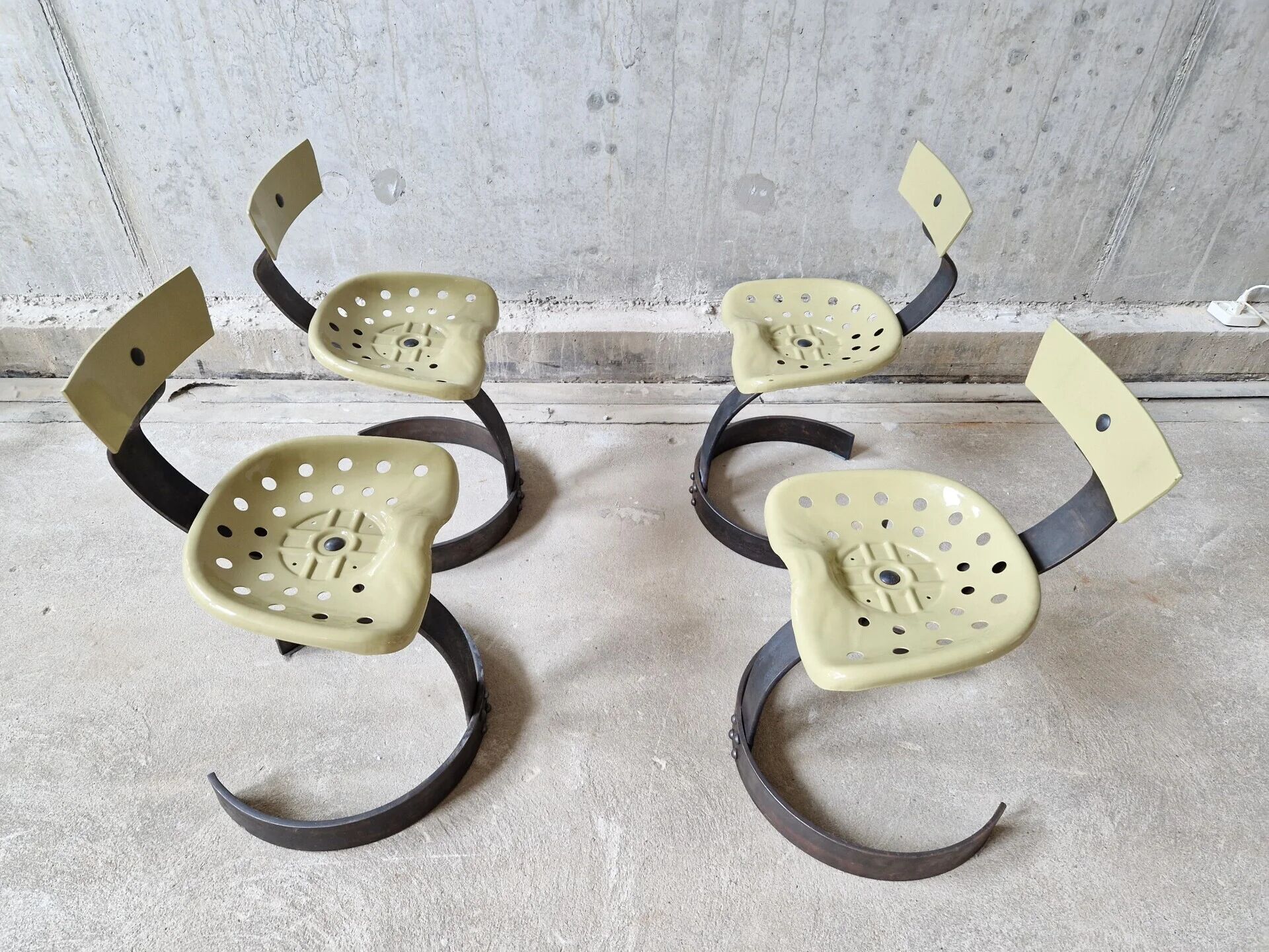 Unique set of 4 metal tractor seat chairs, 1990