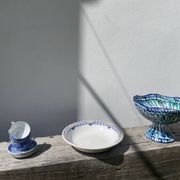 Round, shallow ceramic salad bowl from Saint Amand