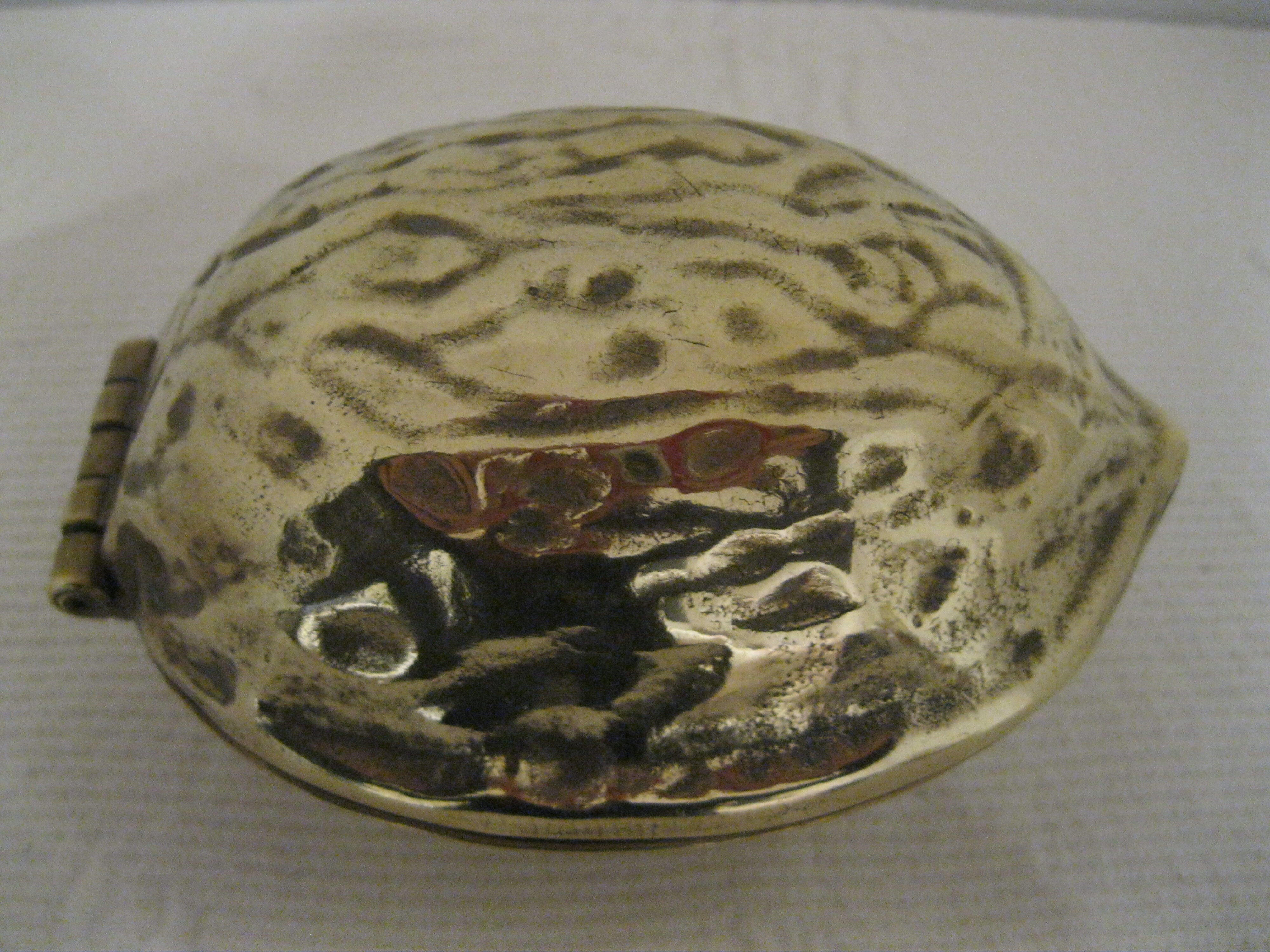Nut-shaped brass nutcracker