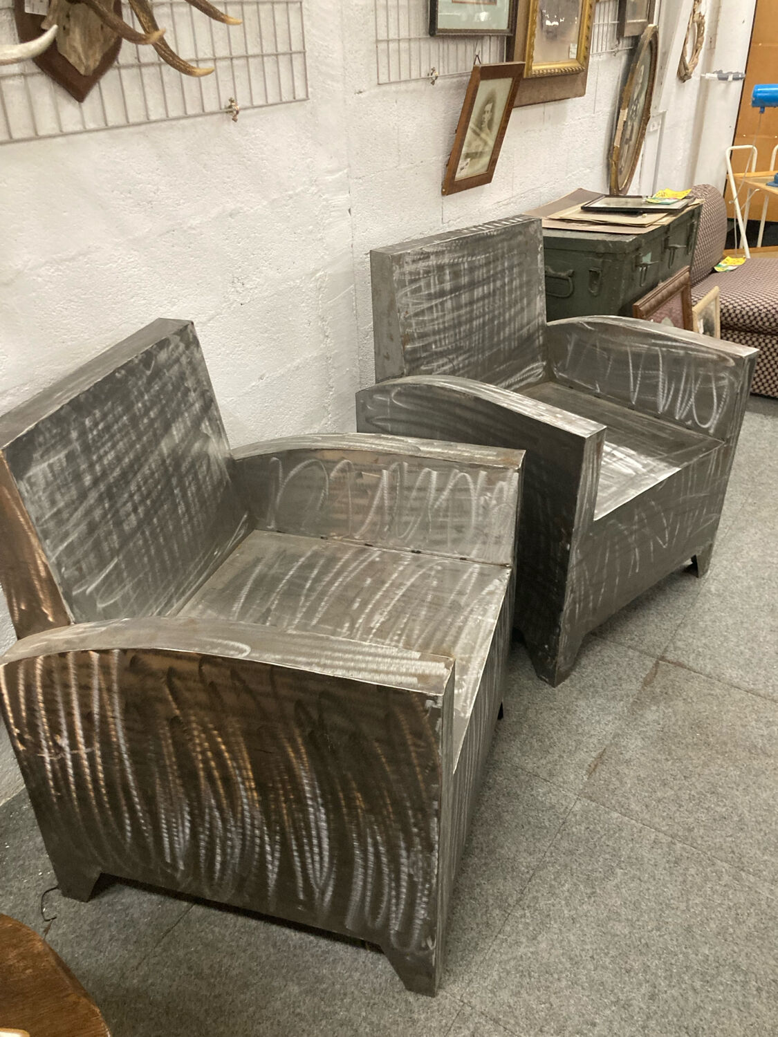 Pair of industrial metal armchairs