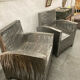 Pair of industrial metal armchairs