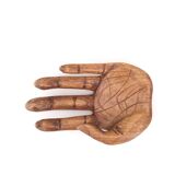 Empty wooden pocket in the shape of a hand, vintage