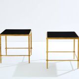 Pair of side tables in gilded iron and black lacquer Maison Ramsay 1950