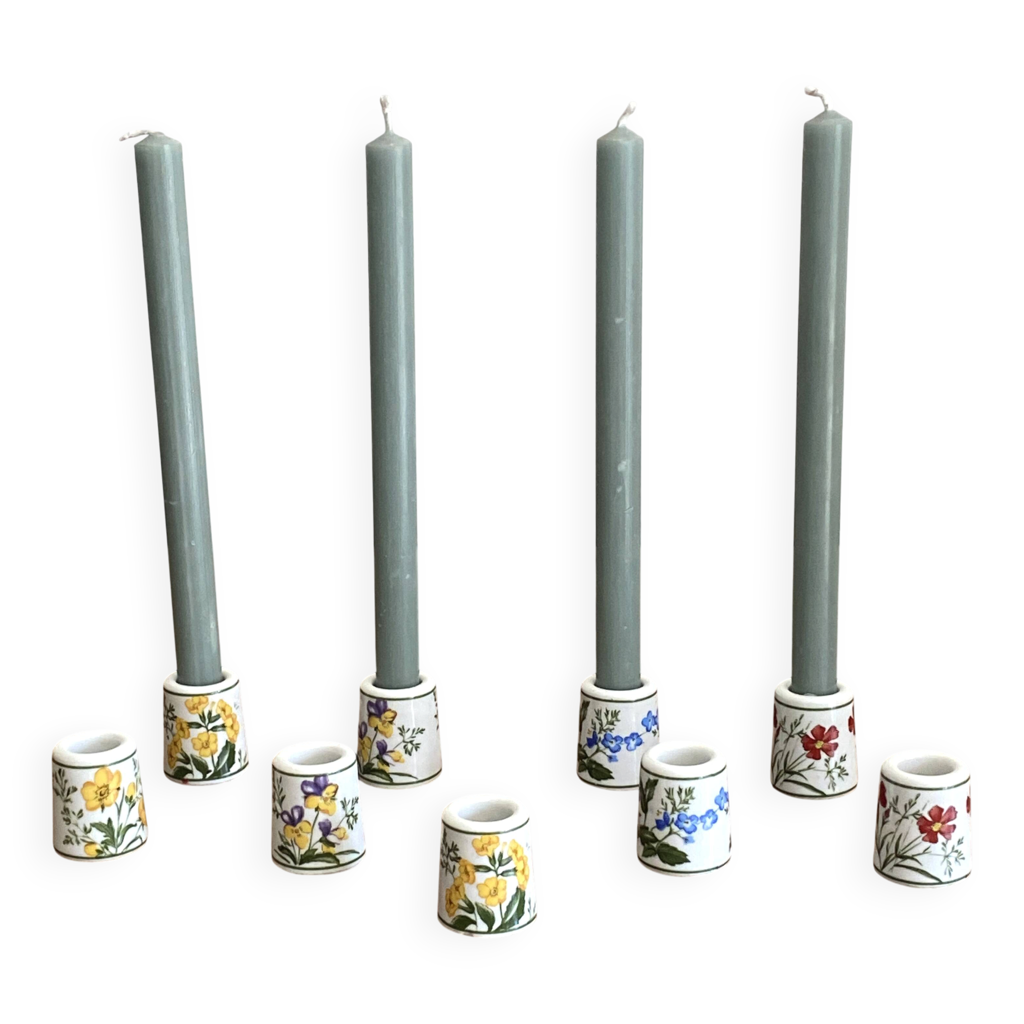 Set of 9 mini vintage porcelain candle holders decorated with spring flowers.