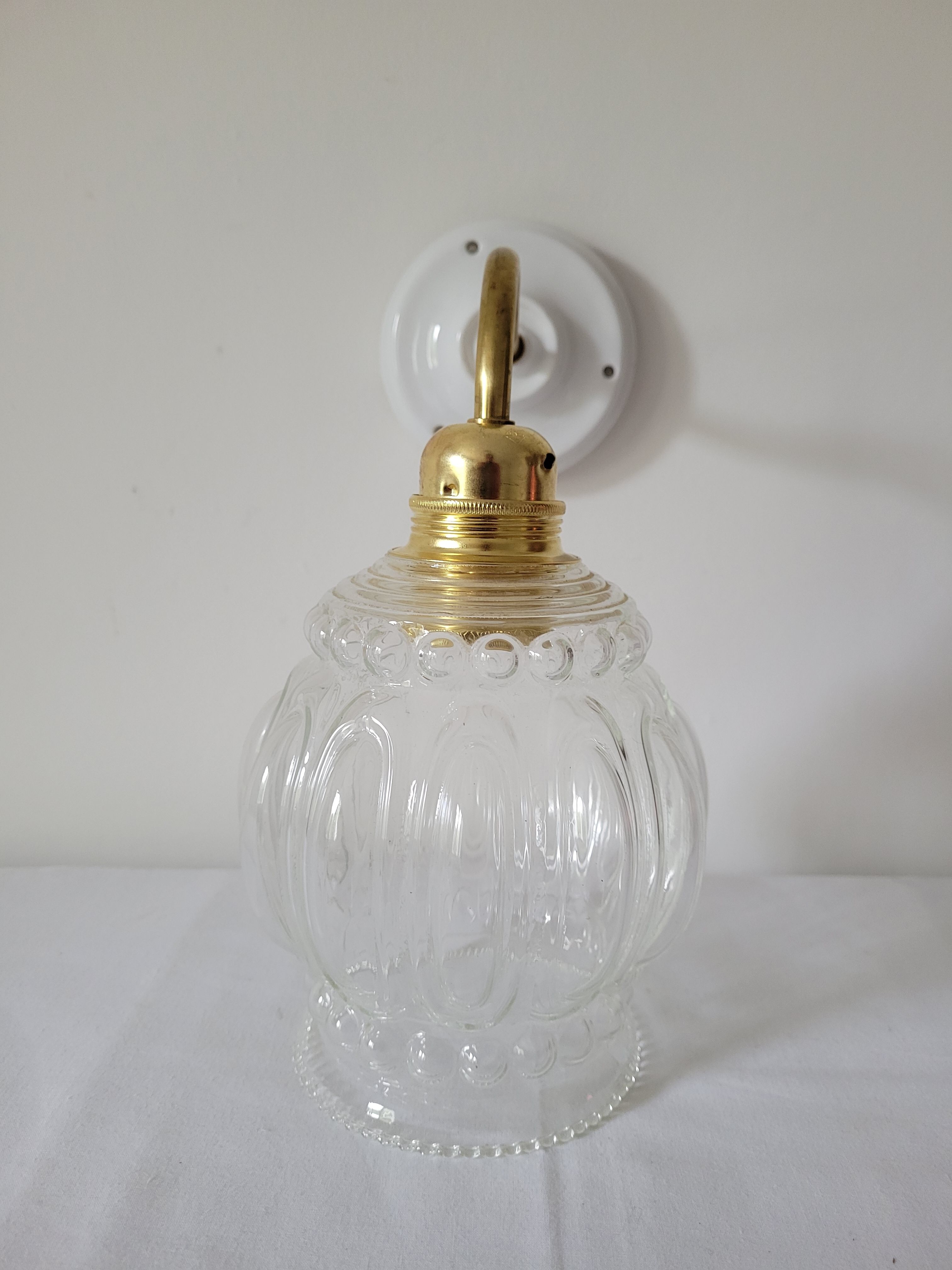 Porcelain, brass and glass wall lamp
