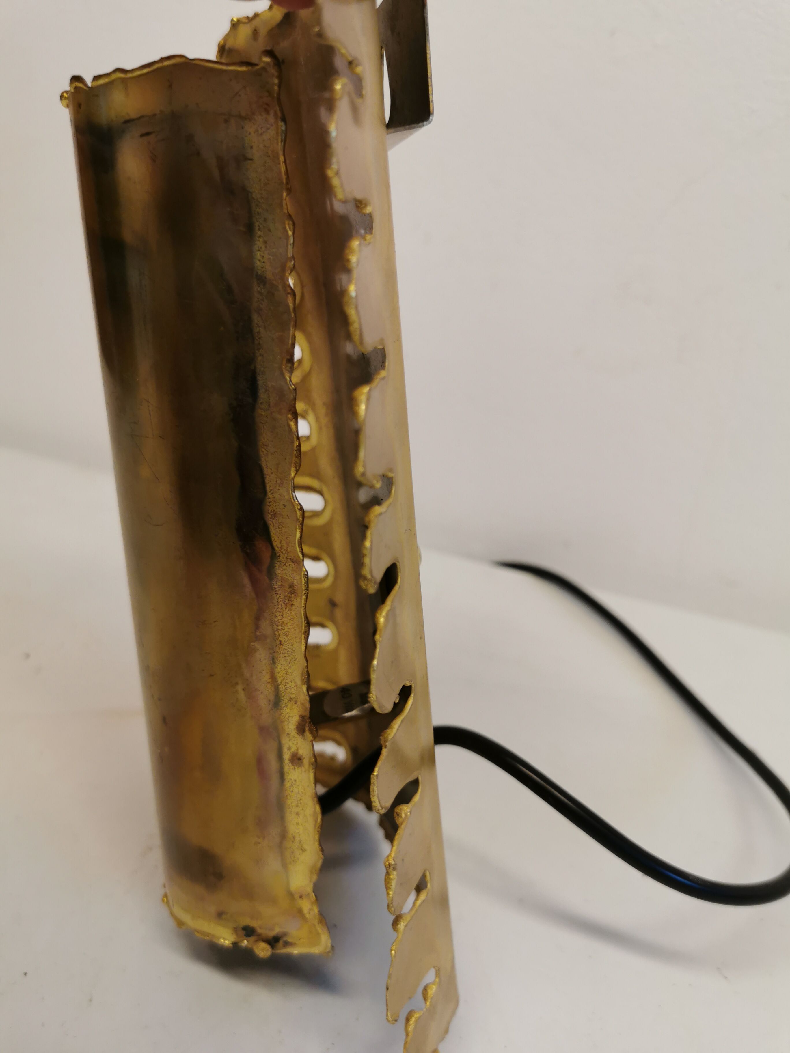 Brutalist flame cut brass wall lamp, designed by the famous Svend Aage Holm Sørensen Denmark