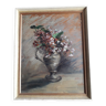 Old oil painting depicting a bouquet of flowers