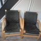 pair set of 2 armchairs with a wooden frame and black fabric weaving