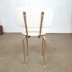 Chaise pied doré courbé cordé simili-cuir