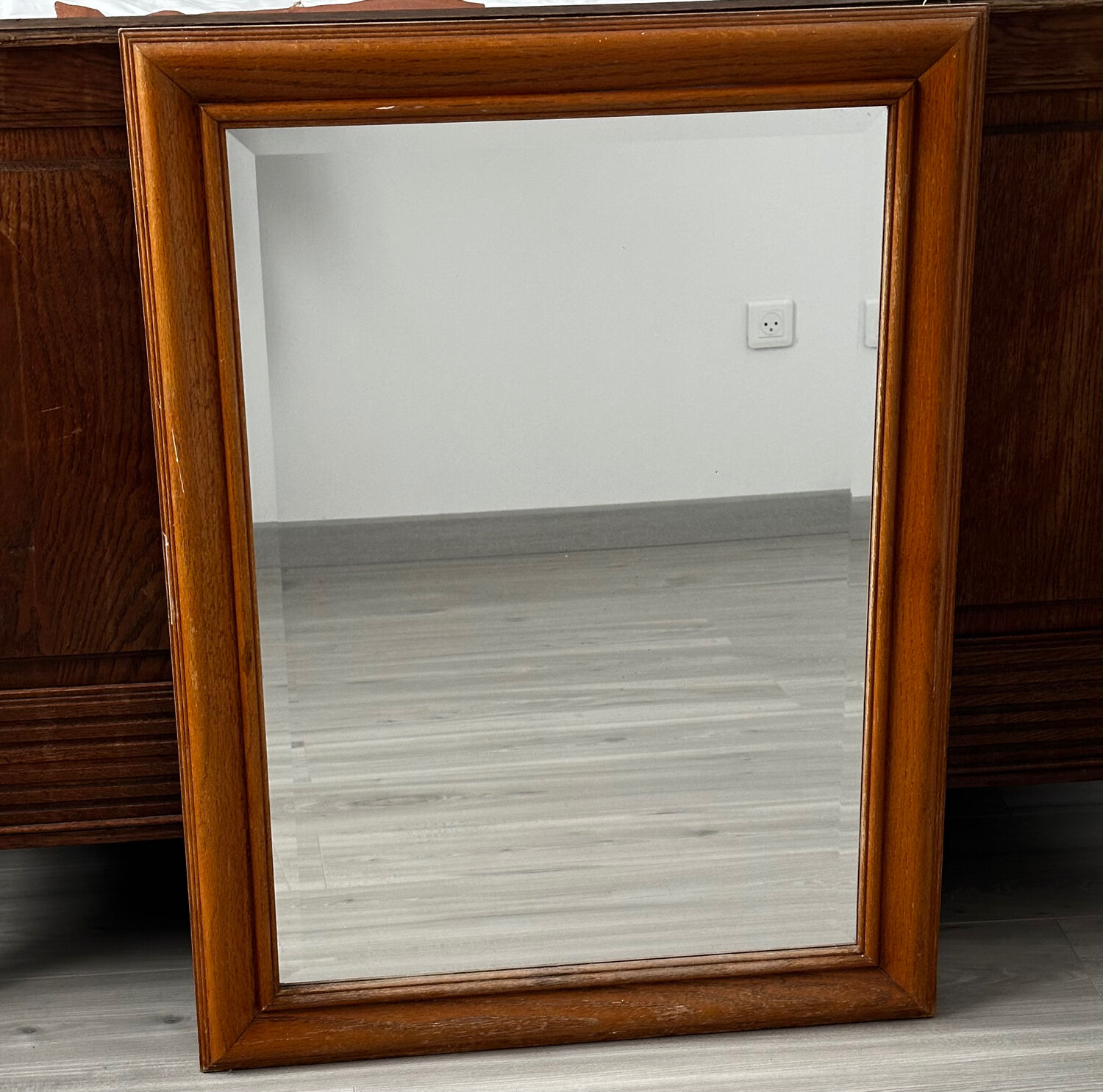 Rectangular light wood mirror from the 1950s with bevelled glass, 83/62 cm.