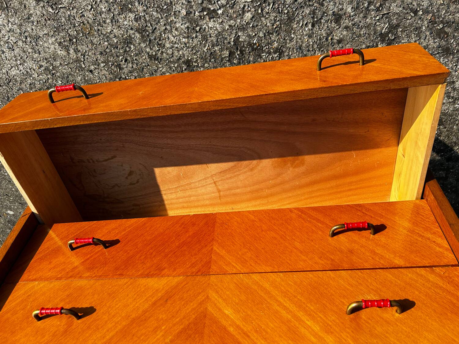 Vintage chest of drawers with compass feet.