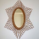 Miroir soleil ovale en rotin des années 60 taille 73x50cm